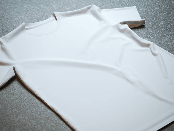 istock White t-shirt on the concrete background 480818380