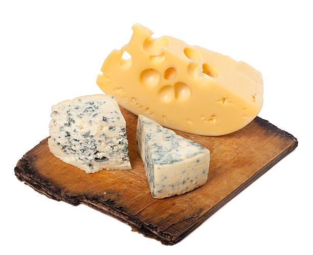 istock Various types of cheese on old wooden kitchen board 480818490