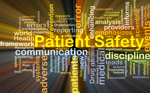 Background concept wordcloud illustration of patient safety glowing light