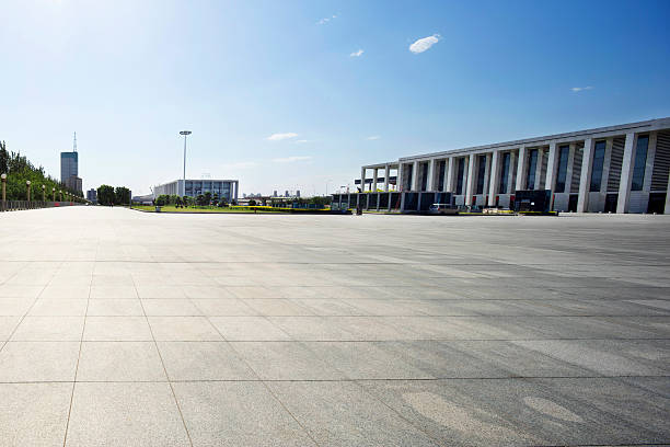 istock long empty footpath in modern city square with skyline. 480827190