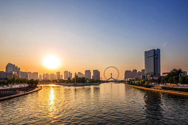 istock modern city skyline and buildings at riverbank during sunset 480829832
