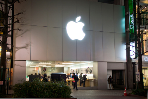 Tokyo, Japan - February 12, 2012: The Apple Store in the Koendori Building in Shibuya Ward of Tokyo. There are two Apple Stores in Tokyo, one in Ginza and one in Shibuya. The Shibuya location is the smaller of the two stores.