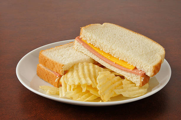 Bacon sandwich with fried egg and salad