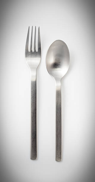 istock stainless steel fork and spoon isolated on a white background 480835531