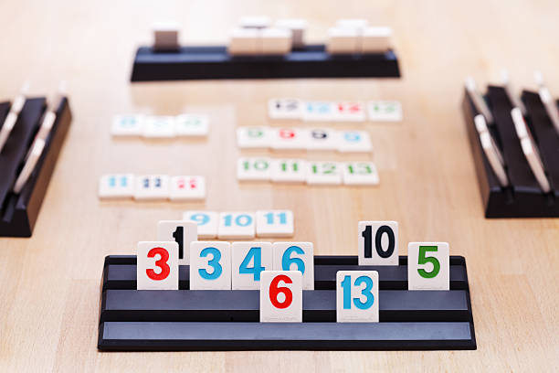 Playing In Rummikub Card Board Game Stock Photo - Download Image