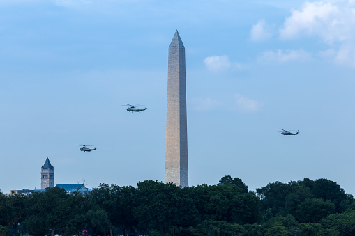 The President of the United States is escorted past the Washington Monument and Old Post Office Building in Marine One en route to the White House South Lawn on the evening of Friday, June 26th, 2015.