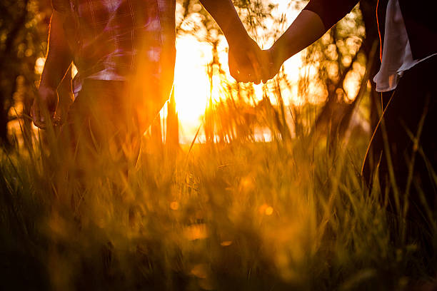 istock Couple Walking and Holding Hands 480844428