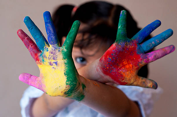 istock Small girl playing with colors 480849697