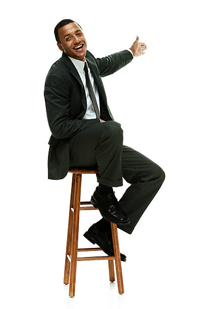 istock Cheerful businessman on stool and presenting 480849984