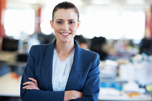 Portrait of an attractive young businesswoman standing in an office