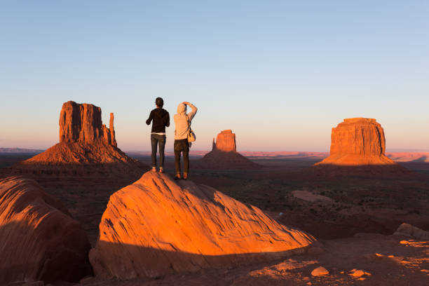 istock Young couple enjoying Monument Valley sunset 480851116
