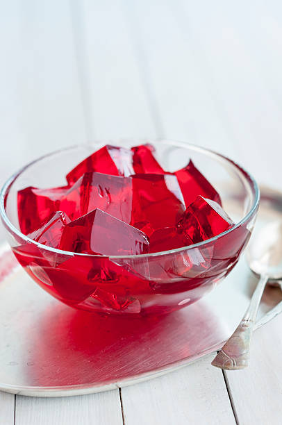 istock Red jelly cubes in glass bowl 480851212