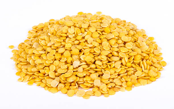 istock Yellow lentils isolated on white background.Macro shot 480856105