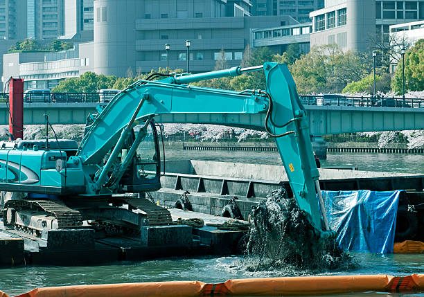istock Crane dredging sediment from river in Osaka 480856723