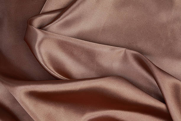 istock Brown Silk cloth of wavy abstract background 480860680