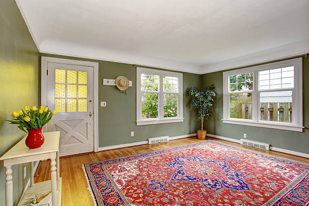 istock Large front room with chic decor and green walls. 480865356