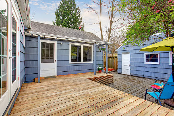 istock Perfect back deck with concrete patio and chairs. 480865418