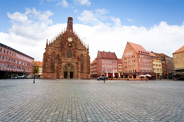 Frauenkirche view on Hauptmarkt square, Nuremberg Frauenkirche view on Hauptmarkt square in Nuremberg, Bavaria, Germany during summer munich cathedral photos stock pictures, royalty-free photos & images
