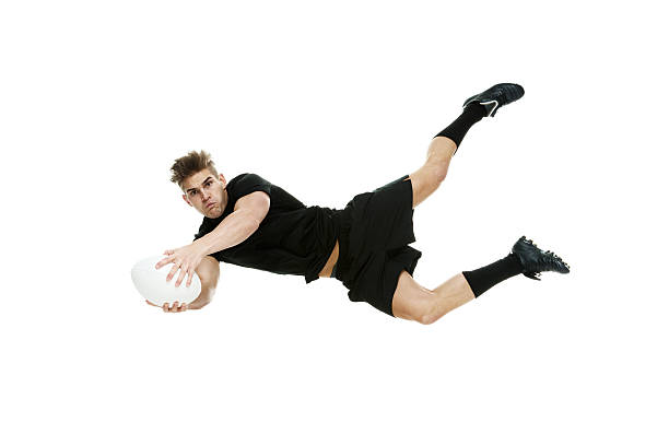 istock Man jumping and catching rugby ball 480867709