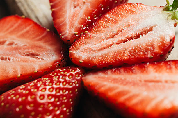 istock strawberry close up on wood table 480868914