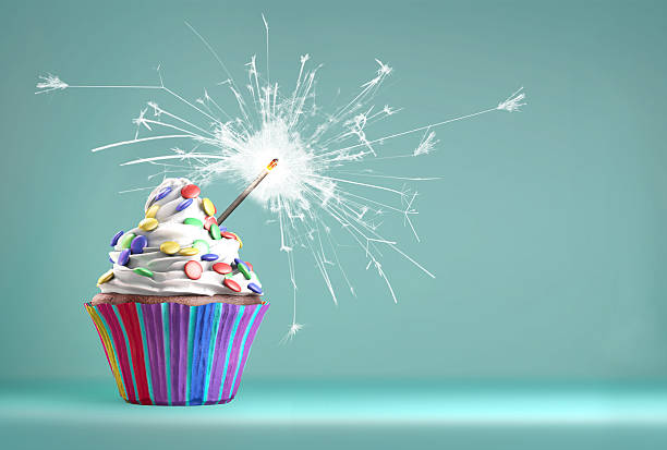 istock Delicious cupcake with a sparkler for an event celebration. 480876786