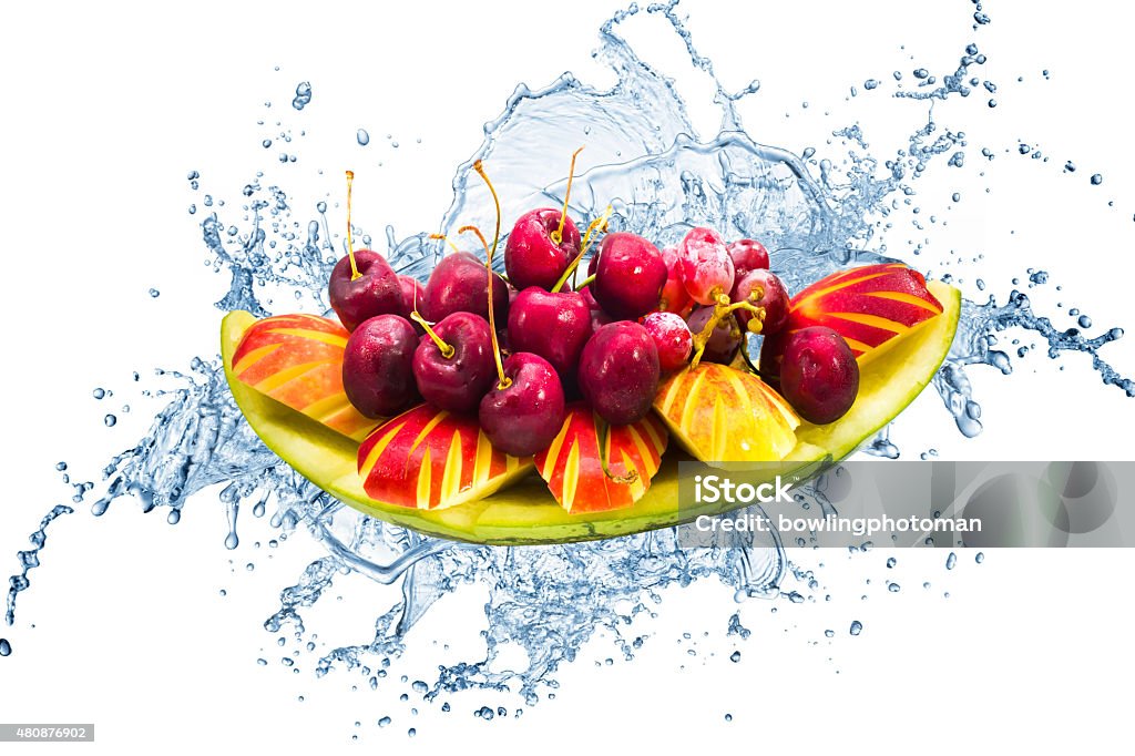 fresh fruit on creative splas water in isolated background healthy fresh fruit on creative splash water in isolated background design 2015 Stock Photo