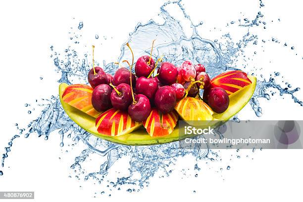 Fresh Fruit On Creative Splas Water In Isolated Background Stock Photo - Download Image Now