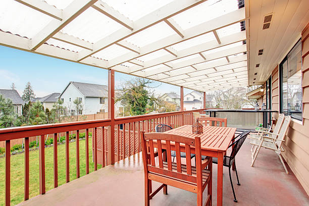 istock Nice covered porch with chairs and tables. 480877298