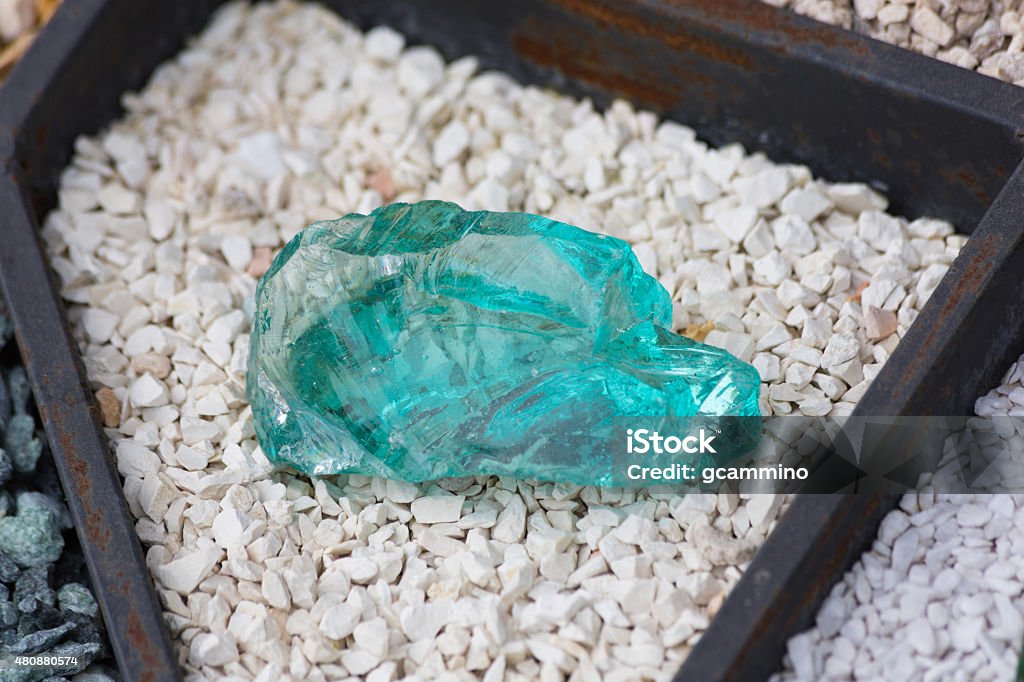 Big blue crystal A view of a big crystal on some little stones 2015 Stock Photo