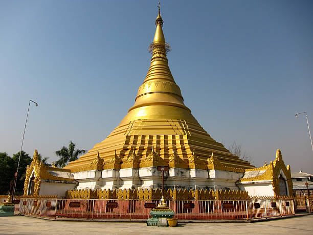 Golden Buddhist stupa Buddhist stupas and temples in Lumbini lumbini nepal stock pictures, royalty-free photos & images