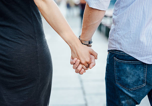 istock young couple holding hands in the city 480881456
