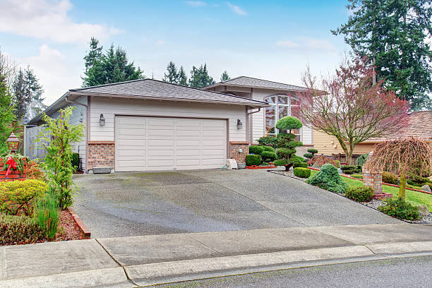 istock Traditional house with brick, driveway, and garage. 480884096