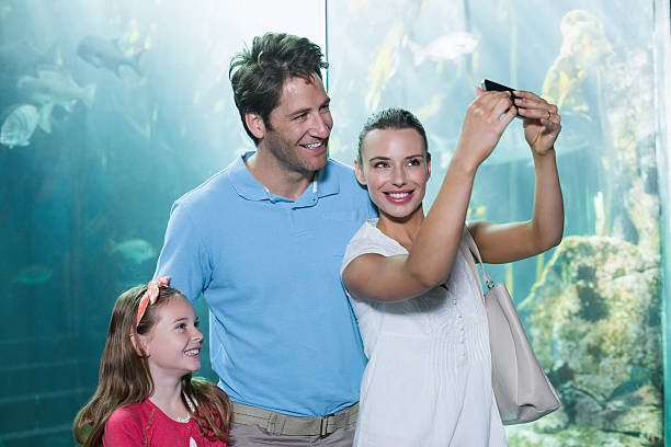 istock Happy family taking a selfie 480884226
