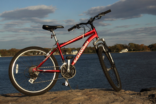 Stamford USA - October 21, 2012: A Schwinn bike is parked on a rocky peninsula point. The Schwinn bike is one of the many products of the Schwinn Company.
