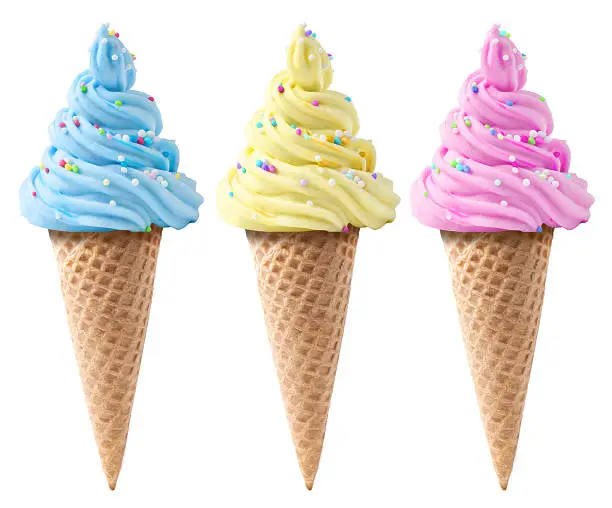 colorful soft ice cream with sprinkles on a white background