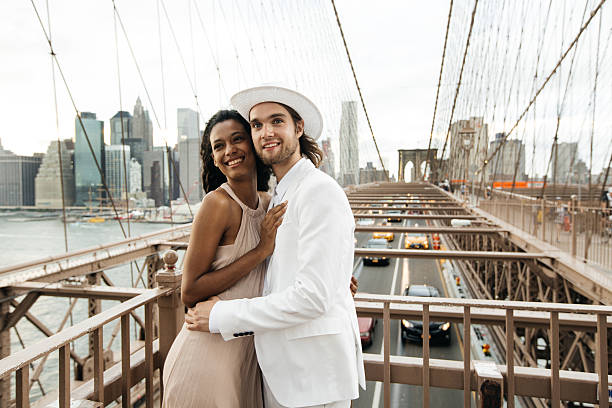 istock Happy Couple on Brooklyn Bridge 480889786