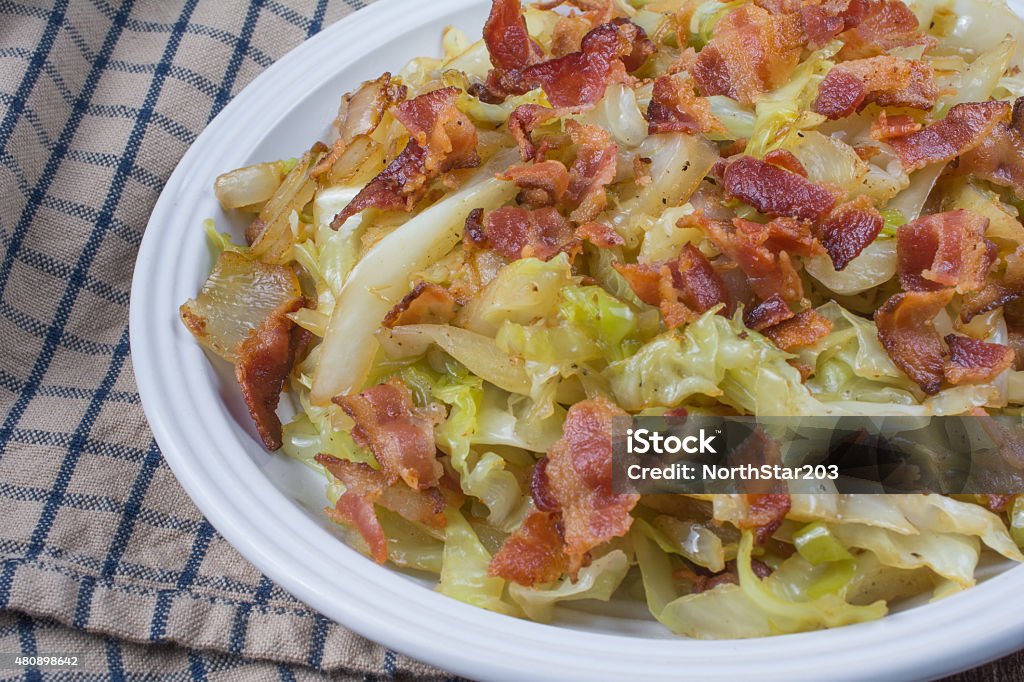 Southern Fried Cabbage with bacon Close up of Southern fried cabbage with bacon. 2015 Stock Photo