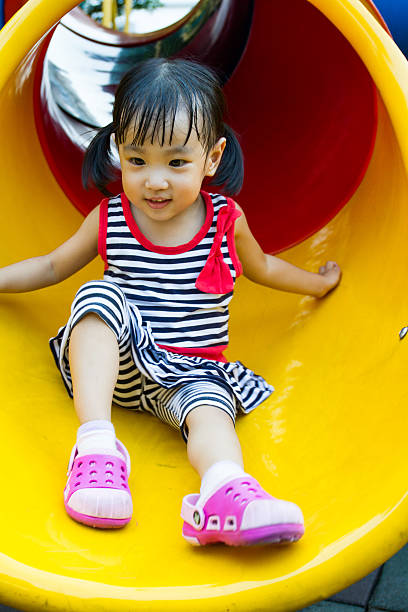 istock Asian kid sliding on Playground 480903446