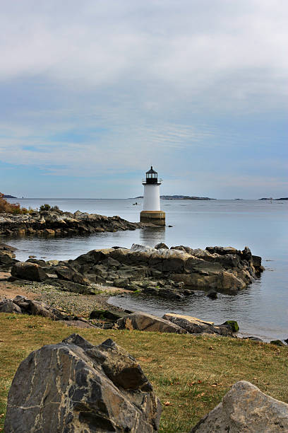 istock Lighthouse on rocky coast in Salem, Massachusetts 480904791