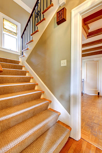 istock Old staircase with green walls and carpet. 480905261