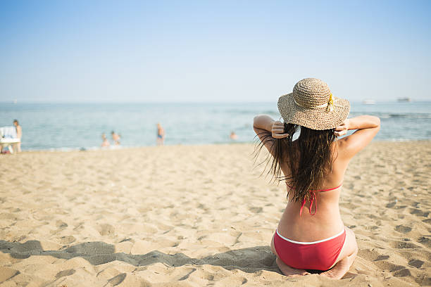 istock Woman on the summer beach 480908023