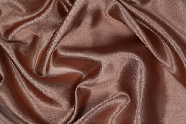 istock Brown Silk cloth of wavy abstract background 480908716