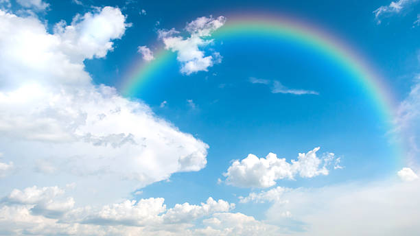 istock Beautiful blue sky background and white clouds with rainbow. 480909556