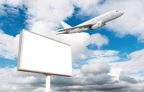istock Airplane with blank billboard, travel andvertisement 480909660