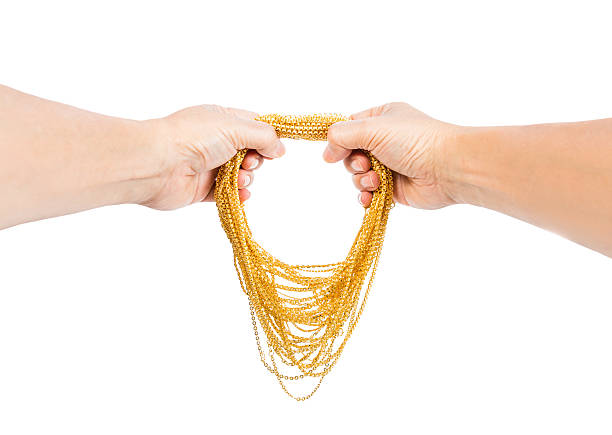 istock golden necklaces 480909816