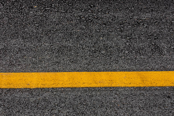 istock Asphalt road texture background with yellow stripes 480910734