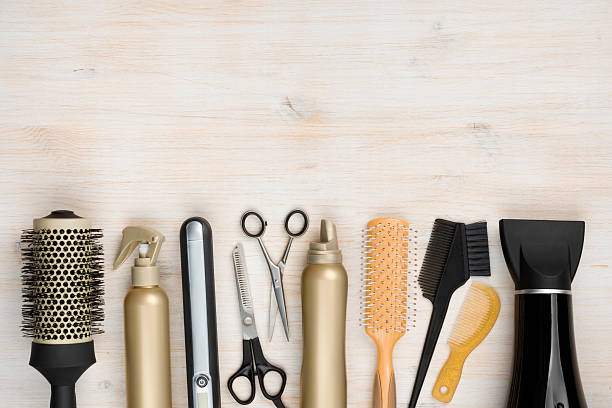 istock Hairdressing tools on wooden background with copy space at top 480912050