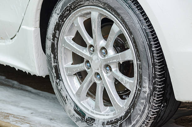istock Foam on the wheels during car wash. 480914368