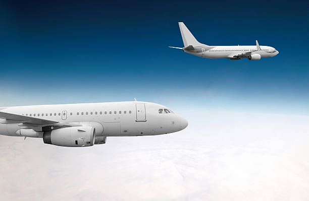 istock Wing of an airplane cruising above the clouds 480914516