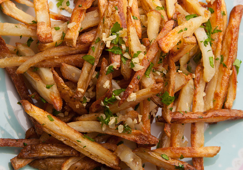 Shoestring fries with garlic and herbs 